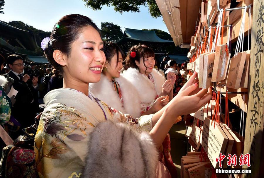 Japanese tour guides greet Coming of Age Day in Tokyo
