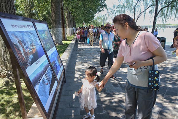 Tourism photo show looking into NE China opens in Beijing