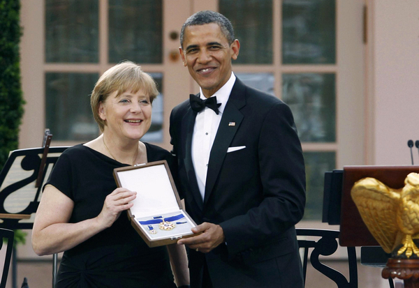 Obama toasts Merkel at Rose Garden dinner