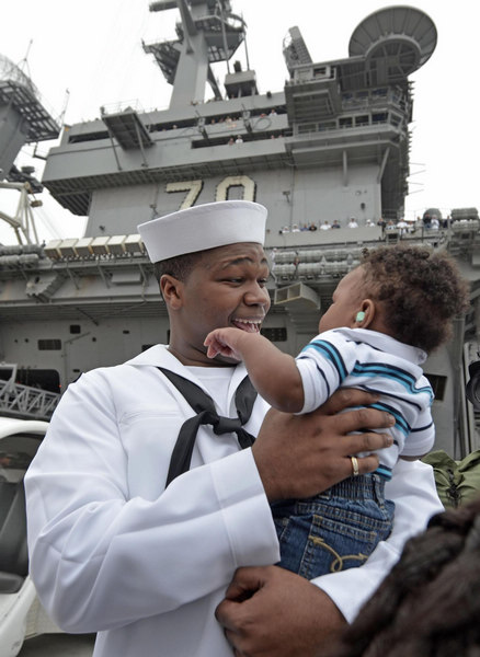 Navy ship that buried bin Laden returns to US port