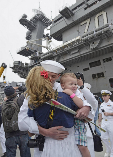 Navy ship that buried bin Laden returns to US port