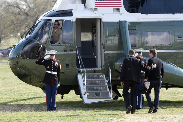 Obama, Cameron watch basketball tournament