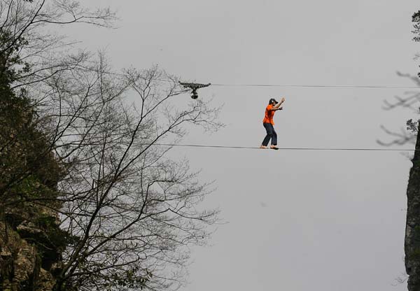 American walks 200m-high tightrope