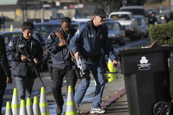 LA police collect guns after mass shooting