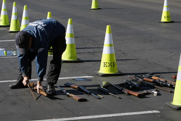 LA police collect guns after mass shooting