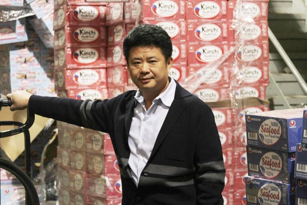 Deng Long: New York supermarket king