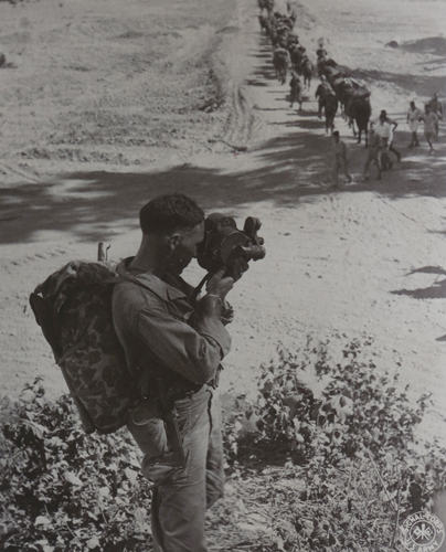 Cameras and carbines capture life during wartime