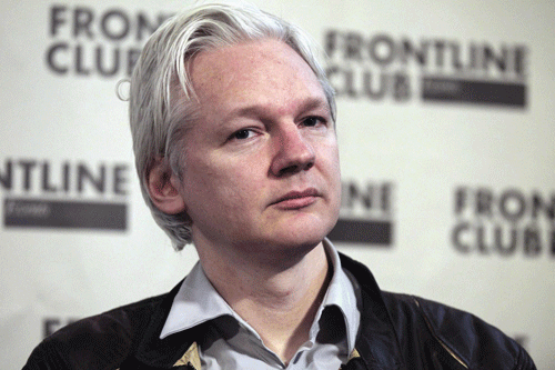 Britain wants to restart Assange talks with Ecuador