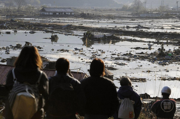 NE Japan coast ravaged by flood, fires after quake