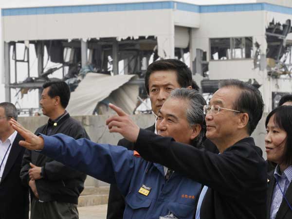 China, SKorea leaders tour devastated Japan region