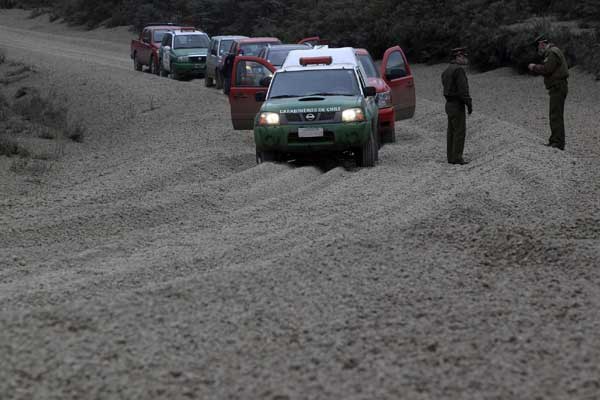 Volcano's fallen ash carpets the land