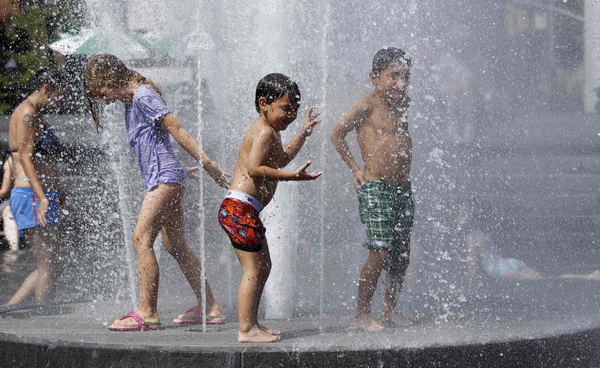 Dive into a pool amid summer heat