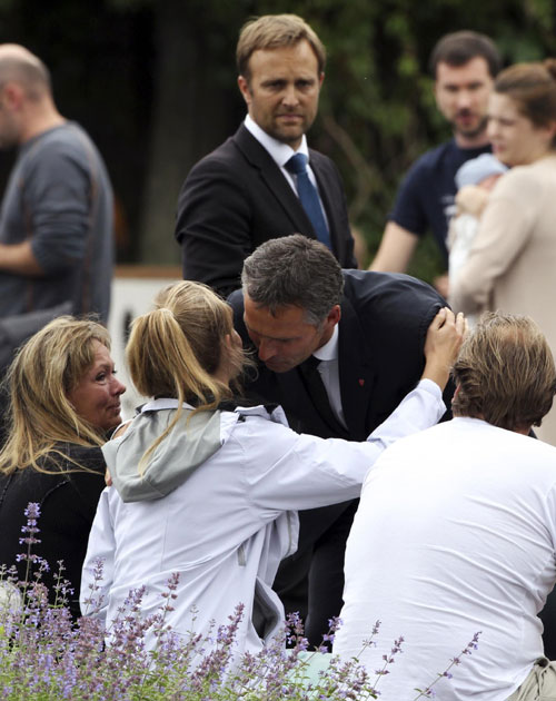 Norway's PM comforts attack survivors