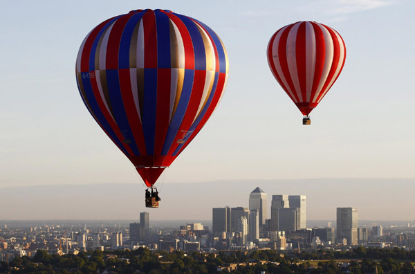 Hot air balloons rise over London