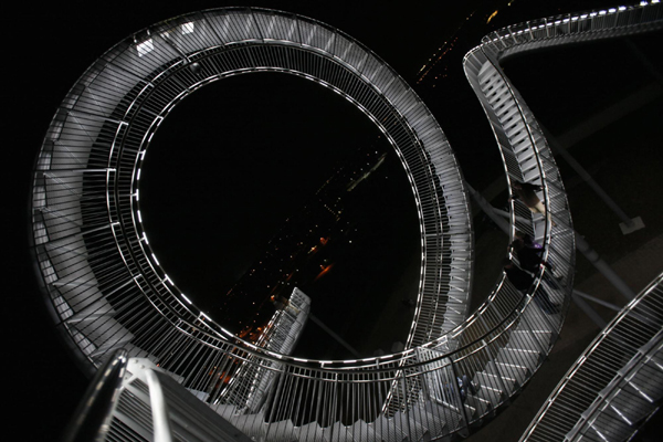 Walk on magical curved steel sculpture