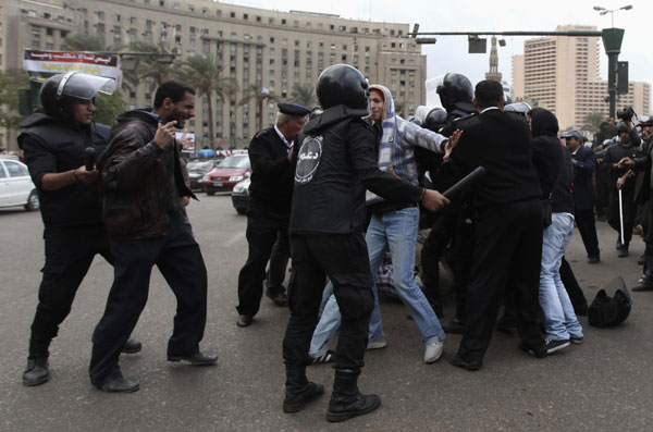 Egypt police, protesters clash over Tahrir square