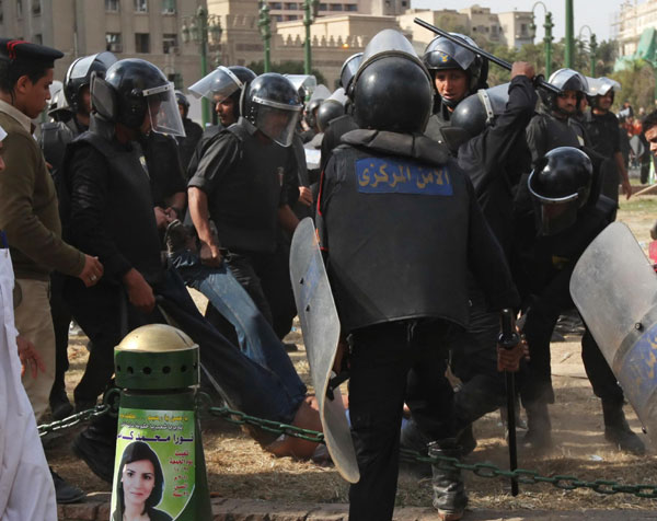 Egypt police, protesters clash over Tahrir square