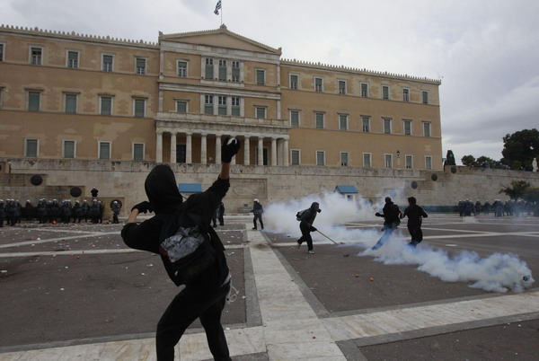 Greek police fire tear gas at protesters in Athens