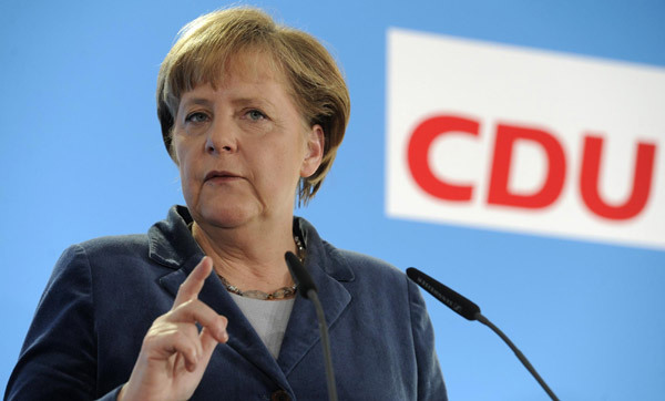 Merkel vows faster eurozone reform