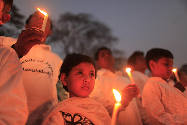 Candlelight vigil held to mark Japanese quake