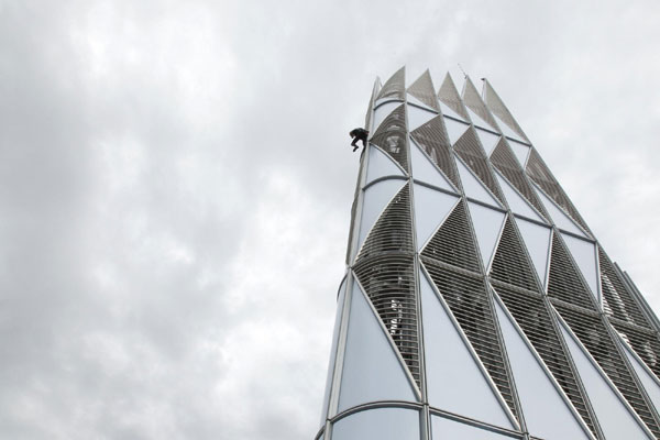 French 'Spiderman' scales First Tower