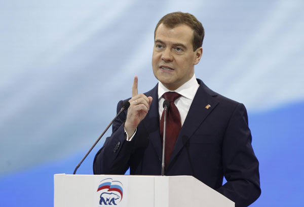 Medvedev succeeds Putin as ruling party leader