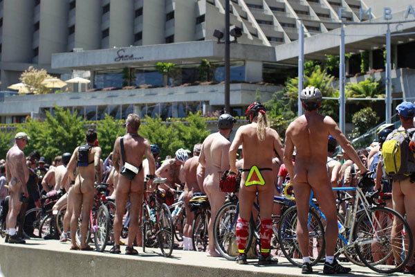 Naked cyclists gather to take part in the World Naked Bike Ride in downtown San Francisco, California June 9, 2012. World Naked Bike Ride hits the street