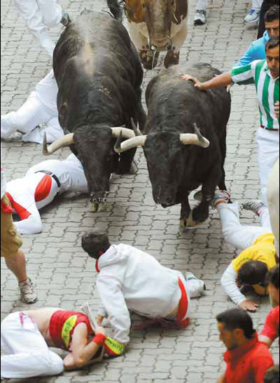 More women running with fighting bulls in Pamplona
