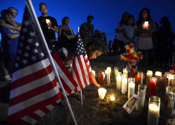 Vigil held in Aurora for theater shooting victims