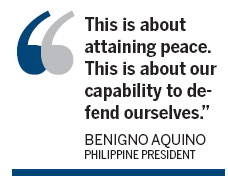Aquino refuses to back off island claim