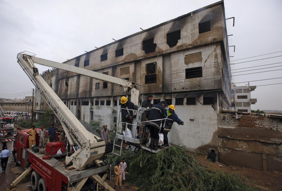 166 killed in garment factory fire in Karachi
