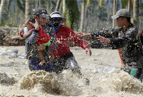 477 dead as homeless swell after Philippine typhoon