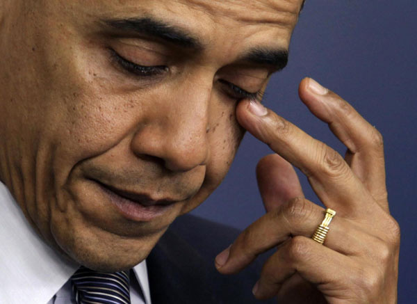 Obama urges solidarity as America mourns shooting victims