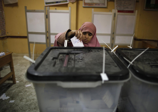 Egyptians vote on disputed constitution