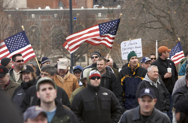 Rallies assail Obama's proposed gun curbs