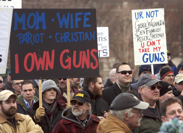 Rallies assail Obama's proposed gun curbs