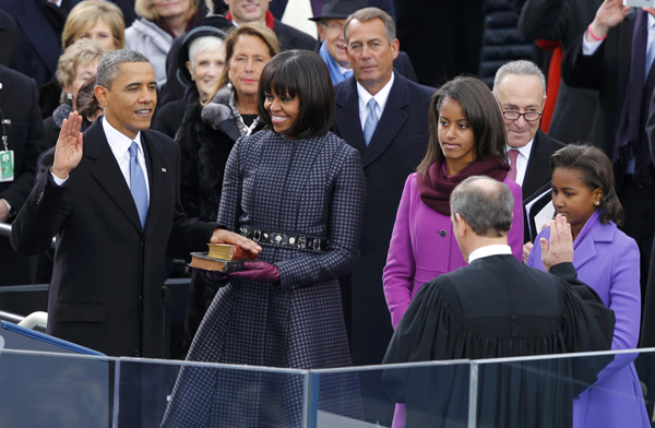 Obama takes oath, calls for unity, peace