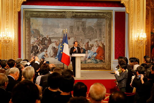 Hollande addresses Chinese New Year party