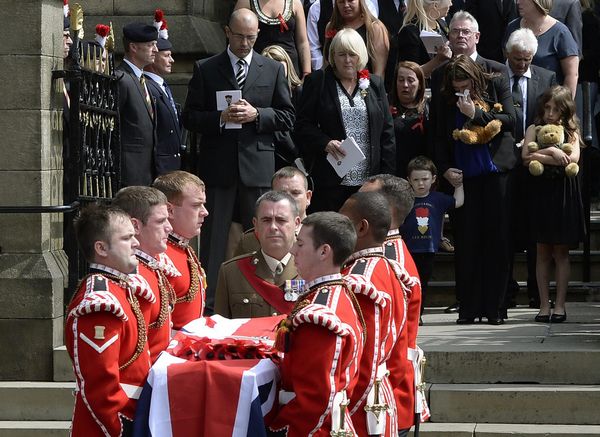 Cameron attends British soldier's funeral