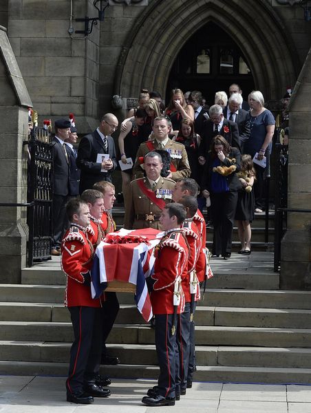 Cameron attends British soldier's funeral