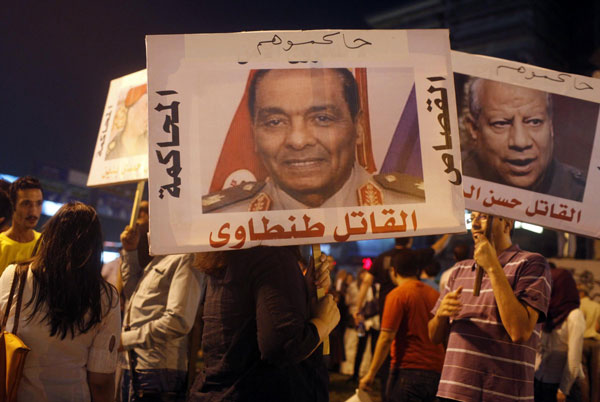 Egypt's rulers to move against Brotherhood vigils