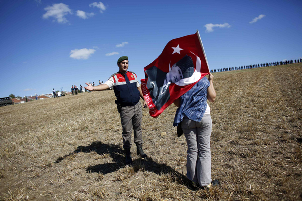 Turkish police clash with protesters over coup trial