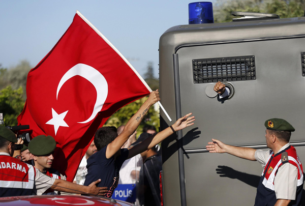 Turkish police clash with protesters over coup trial