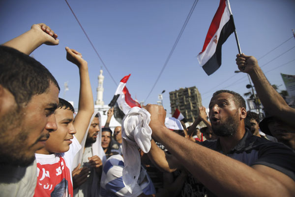 Morsi supporters dig in as Egypt talks stall