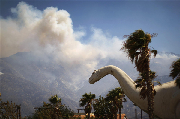 California wildfire destroys 26 homes