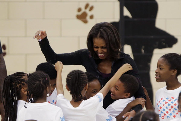 US First Lady joins O'Neal at back to school event