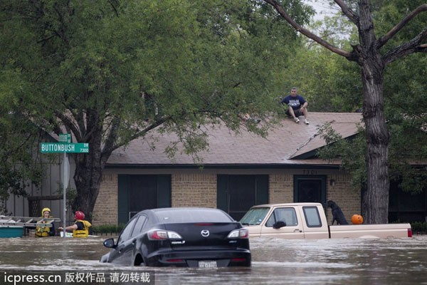 Flooding sweeps Texas, killing 2