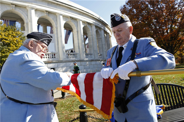 US honors its veterans with ceremonies, parades