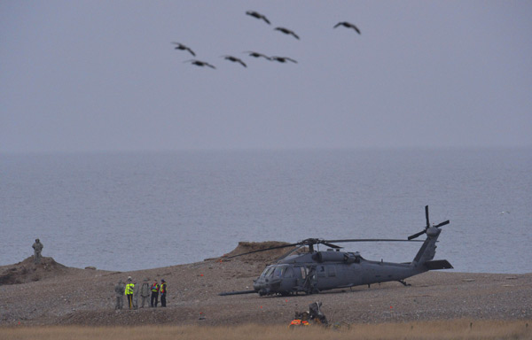 UK police pick through US helicopter crash site