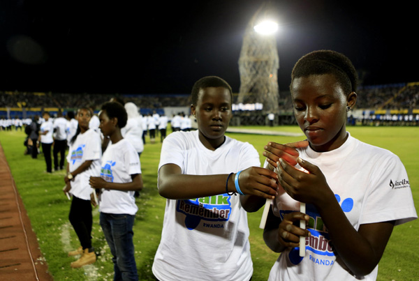 Rwandans told 'never again'